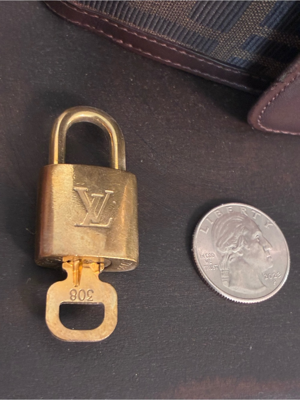Louis Vuitton Gold-Tone Padlock and Matching Key